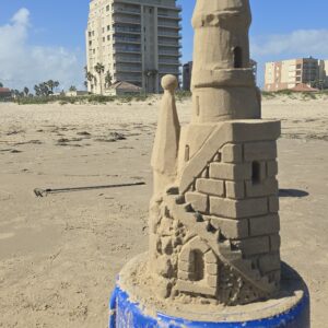 Sandcastle tools can be made from anything including stainless steel shot cups that are used to make small sandballs that are placed op top of the tower roofs of sandcastles