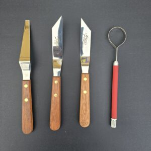 A selection of custom handmade sandcastle building tools by andy hancock of sandcastle lessons in south padre island texas.